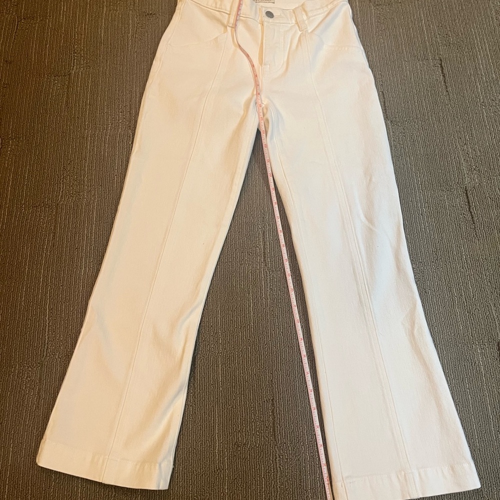 Never been worn Lucky Brand mid-rise boot cut jean size 0/25.